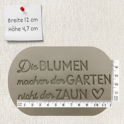 Die Blumen machen den Garten