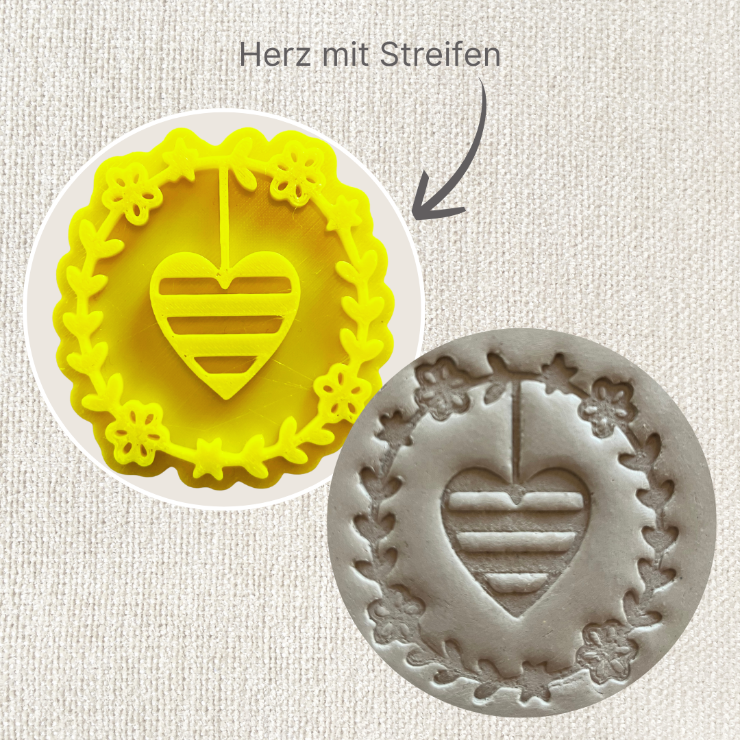 Runder Anhänger-Stempel von ARTHummeln mit Kreisdesign, sichtbar auf weißem Hintergrund.