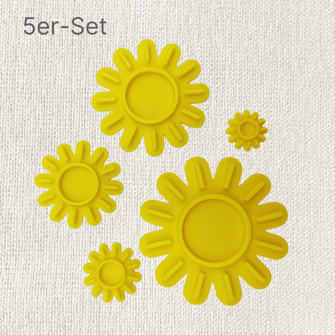 Fünf ARTHummeln Stempel mit Sonne-Motiven im 5er Set, ideal für kreative Bastelprojekte und Dekorationen.