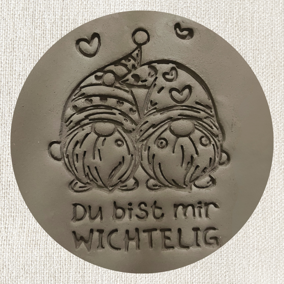 Runder ARTHummeln Stempel mit "Du bist mir wichtelig" Schriftzug, geeignet für Karten und Bastelprojekte.