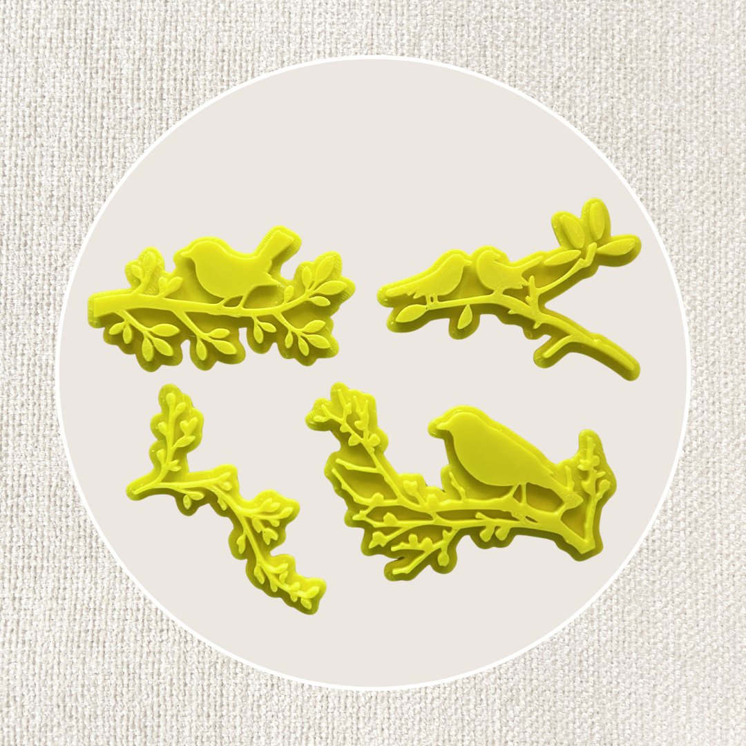 Vier Vögel und Äste Tonstempel, ideal für Töpferarbeiten, aus dem 4er Set im Tonstempel und Überformen Shop.