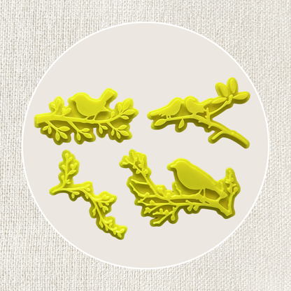 Vier Vögel und Äste Tonstempel, ideal für Töpferarbeiten, aus dem 4er Set im Tonstempel und Überformen Shop.